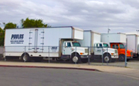 Our trucks in front of the warehouse.